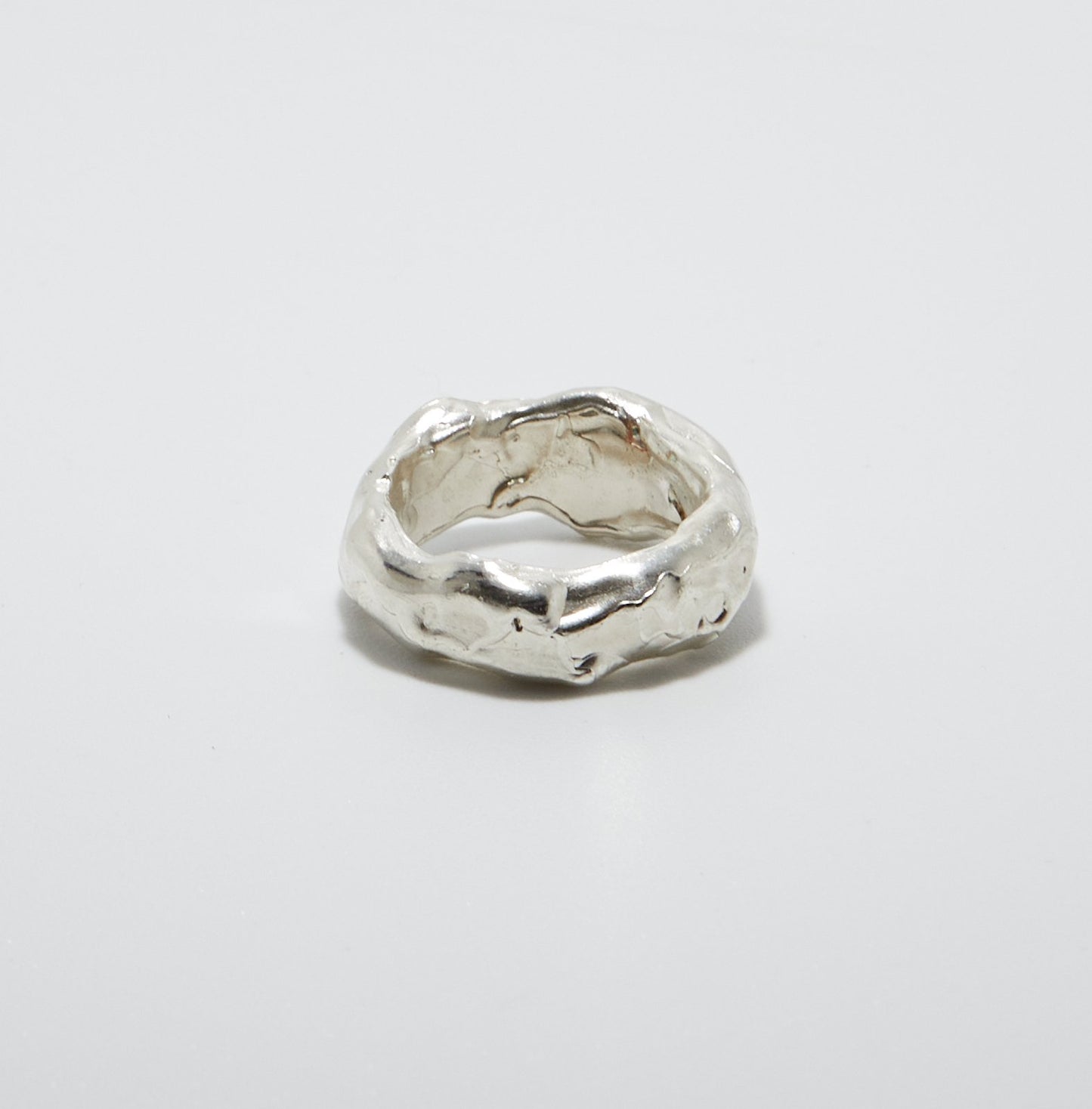 Sterling Silver ring on a light grey background