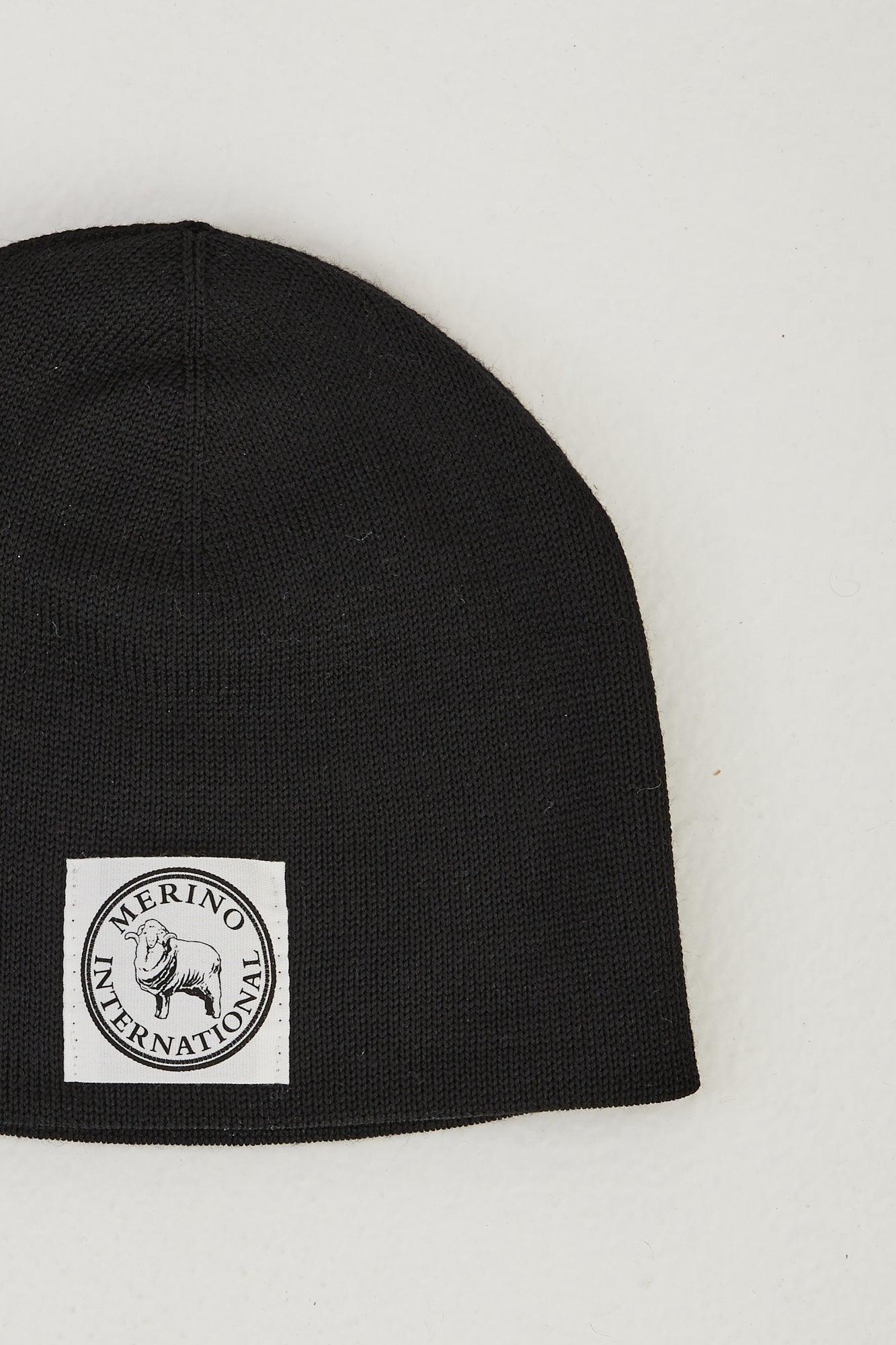 Close up image of a merino wool beanie flat lay