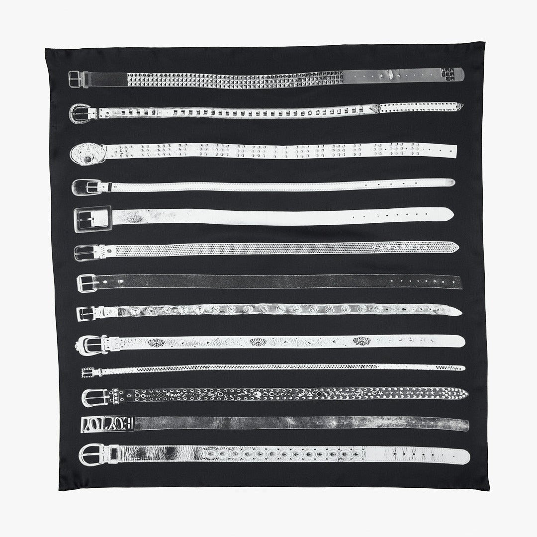 Silk scarf with scans of a belt collection printed onto a black background