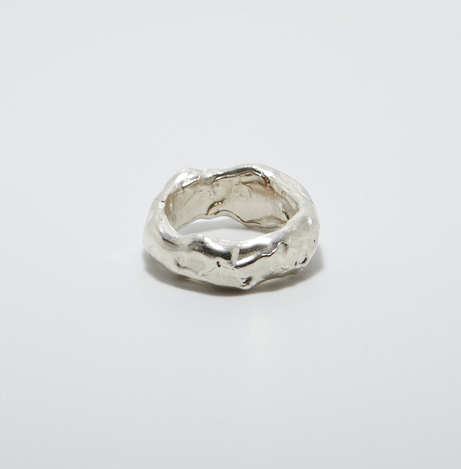 Sterling Silver ring on a light grey background