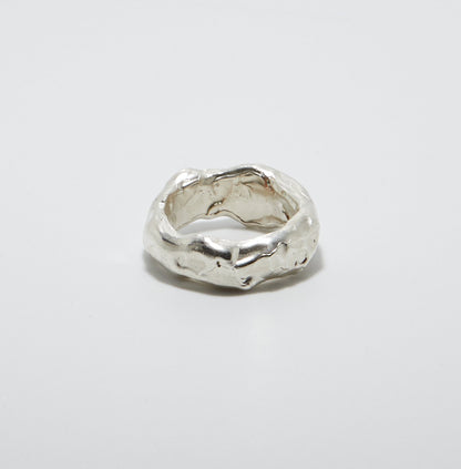 Sterling Silver ring on a light grey background