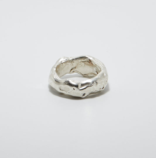Sterling Silver ring on a light grey background